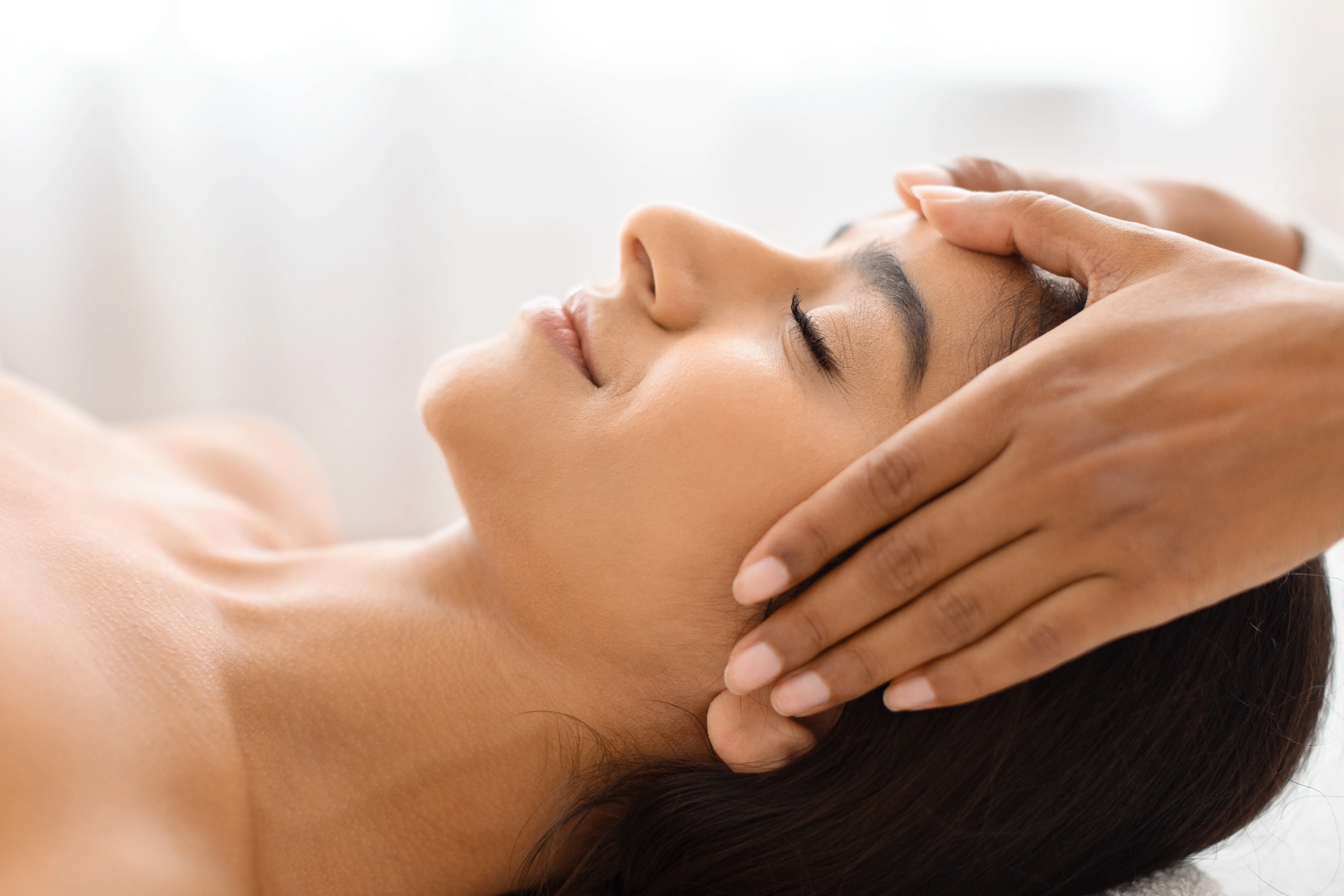 Woman having neck massage